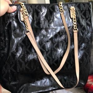 Gloss finished Michael Korda bag